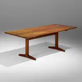 Trestle dining table by George Nakashima, 1960, American black walnut, rosewood, sold Sep 2023