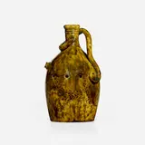 Rare puzzle jug with snake by George E. Ohr, 1895-96, glazed earthenware, sold Sep 2023