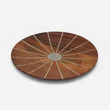 Charger by Phillip Lloyd Powell and Paul Evans, 1956-57, walnut, pewter, sold Nov 2025