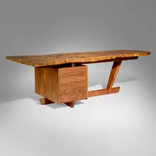 Custom desk by Mira Nakashima, 1998, Carpathian elm burl, American black walnut, sold Oct 2025