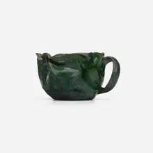 Mug by George E. Ohr, 1898-1910, glazed earthenware, sold Sep 2023