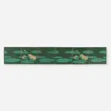 Six-tile frieze with water lilies by Grueby Faience Company, c. 1905, glazed earthenware decorated in cuenca, sold Sep 2023