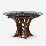Albert Paley, Meridian table, 2015, forged, formed and fabricated steel with natural patina, glass