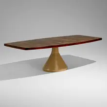 Guanabara dining table by Jorge Zalszupin, 1959, rosewood, leather upholstery over wood, sold Oct 2025