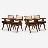 Office chairs from Chandigarh, set of four by Pierre Jeanneret, c. 1960, teak, cane, linen upholstery, sold Oct 2025