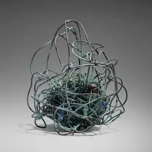 Fused Sun by Claire Falkenstein, c. 1962, welded copper and fused Venetian glass, sold Oct 2025