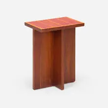 Occasional table by Vladimir Kagan, c. 1950, walnut, enameled brass, sold Oct 2025