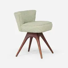 Vladimir Kagan, Swivel chair, c. 1950, walnut, upholstery