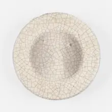 Low bowl by Glen Lukens, c. 1940, crackle-glazed earthenware, sold May 2023