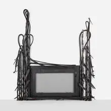 Albert Paley, Forged fireplace surround, 1991, forged and fabricated steel with a blackened finish, steel mesh screen