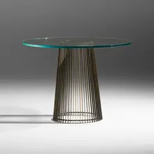 Dining table by Paul Evans, 1960, enameled steel, 23 karat gold leaf, glass, sold May 2023