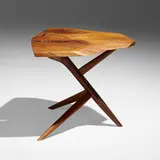 Conoid Cross-Legged end table by George Nakashima, 1977, American black walnut, rosewood, sold May 2023