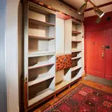 Phillip Lloyd Powell, Bookcase, c. 1975, walnut, rosewood, zebrawood, painted wood, cast iron