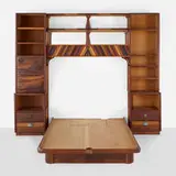 Phillip Lloyd Powell, Queen bedframe and surround, c. 1990, walnut, ash, cocobolo, ebony, painted wood, mirrored glass, patinated metal, bone inlay