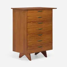 Origins cabinet, model 208 by George Nakashima, c. 1958, walnut, brass, sold Oct 2025