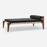 Daybed from Chandigarh by Pierre Jeanneret, c. 1955-56, teak, linen upholstery, webbing, sold Oct 2025