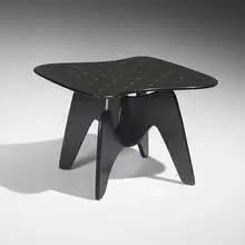 Chess table, model IN-61 by Isamu Noguchi, 1944, lacquered ash plywood, cast aluminum, acrylic inlays, steel, sold Oct 2025