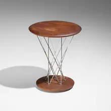 Early Rocking stool, model 86T by Isamu Noguchi, c. 1954, walnut, chrome-plated steel, sold Oct 2025
