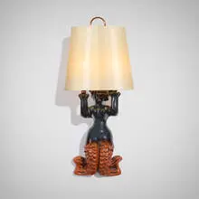 Sirène wall sconce by Georges Jouve, 1948, glazed stoneware, copper, vellum, sold Oct 2025