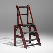 Folding library ladder by Phillip Lloyd Powell, c. 1990, walnut, ebonized wood, leather, patinated metal, sold May 2023