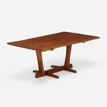Conoid dining table by George Nakashima, 1971, American black walnut, rosewood, sold May 2023