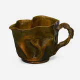 Pitcher by George E. Ohr, 1897-1900, glazed earthenware, sold May 2023