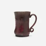 Mug by George E. Ohr, 1898-1910, glazed earthenware, sold May 2023