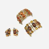 Tony Duquette and Hutton Wilkinson, Collection of jewelry, c. 1995, gold-plated metal, glass