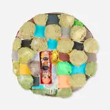 Brian Belott, Tondo Puff (Green), 2016, cotton batting, colorfast paper, acrylic, matte medium, remote control with matte medium, colored sand and stones