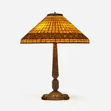 Greek Key table lamp by Tiffany Studios, c. 1910, leaded glass, patinated bronze, sold May 2023