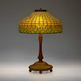 Greek Key table lamp by Tiffany Studios, c. 1910, leaded glass, patinated bronze, sold May 2023