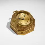 Adam desk clock by Tiffany Studios, c. 1910, gilt bronze, sold May 2023