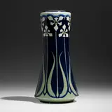 Mary Sheerer for Newcomb College Pottery, Early and Tall vase with stylized lilies, 1902, glazed earthenware