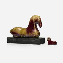 Horse figures, set of two by Ulla and Gustav Kraitz, c. 2000, oxblood-glazed stoneware, stone base, sold Sep 2025