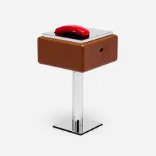 Custom telephone table by Warren Platner, c. 1970, chrome-plated steel, leather, plastic, sold Sep 2025