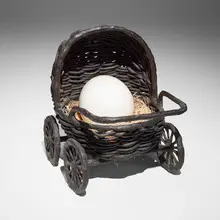 Liz Craft, Baby Carriage, 2008, bronze, porcelain, raffia