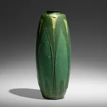 Grueby Faience Company, Rare and Exceptional vase with calla lilies, 1898-1910, glazed earthenware
