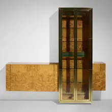 Custom Cityscape wall unit by Paul Evans, c. 1980, burl, brass, glass, lacquered wood, sold Jan 2023