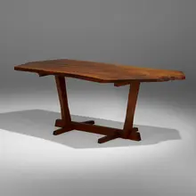 Exceptional Conoid dining table by George Nakashima, 1963, English walnut, rosewood, sold Jan 2023