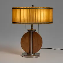 Table lamp by attribution Walter von Nessen, c. 1930, walnut, chrome-plated brass, fiberglass, lacquered steel, sold Aug 2025
