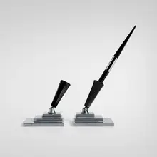 Pen holders, pair by Art Déco, c. 1935, aluminum, Bakelite, sold Aug 2025