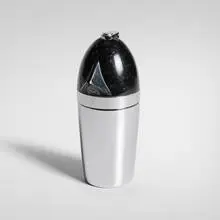 Soda King syphon bottle by Norman Bel Geddes, 1935, chrome-plated brass, enameled aluminum, sold Aug 2025
