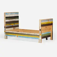 Piet Hein Eek, Single bed frame, c. 2005, lacquered, stained, and painted scrapwood, steel, casters
