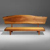Daybed with Back by George Nakashima, 1973, American black walnut, upholstery, sold Jan 2023