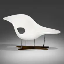 La Chaise by Charles and Ray Eames, lacquered fiberglass, chrome-plated steel, oak, sold Aug 2025