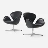 Arne Jacobsen, Swan chairs model 3320, pair, 1957 / 2006, leather upholstery, aluminum, chrome-plated steel, plastic