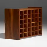 Bottle rack from Folly Cottage, Exton, PA by George Nakashima, 1974, American black walnut, sold Jan 2023