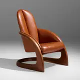 Crescent chair by Wendell Castle, 1978, walnut, leather, sold Jan 2023