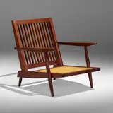 Cushion armchair by George Nakashima, 1962, American black walnut, upholstery, sold Jan 2023