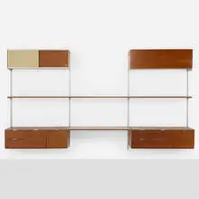 CSS (Comprehensive Storage System) by George Nelson & Associates, 1959, walnut, aluminum, lacquered Masonite, sold Aug 2025